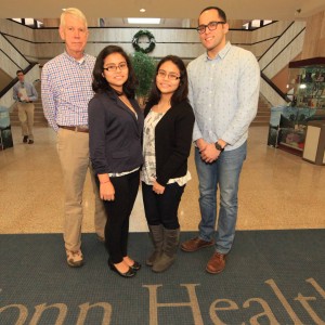 From left, Professor Paul Edelen with MCC students Katia and Kiara Ruesta, and David Machado visited medical school classes at UConn.